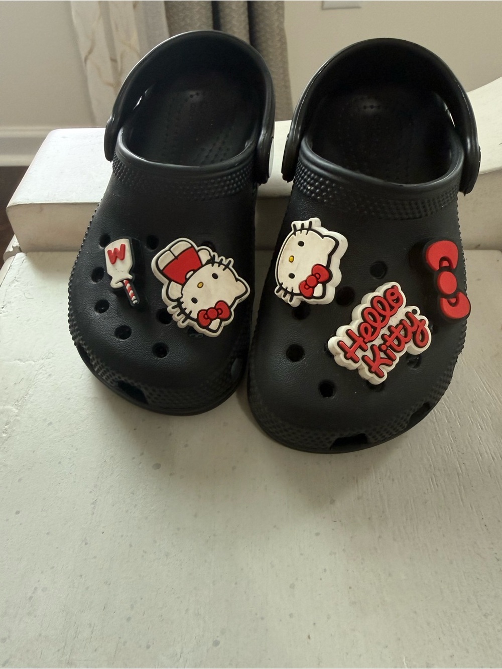 CROCS Kids Black Clog Sandals with Red & White Hello Kitty Charms